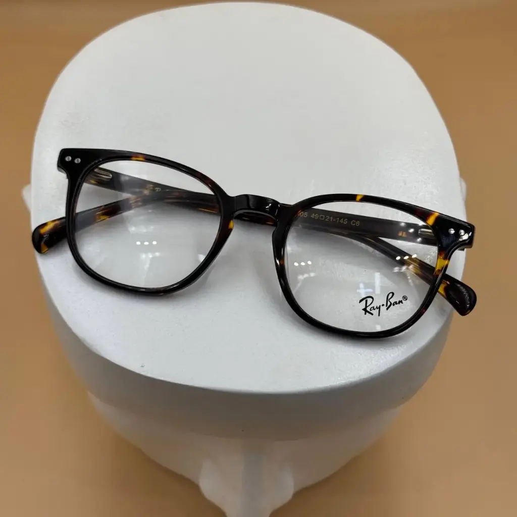 [HOMME RAYBAN 20005 49-21] PHOTOGRAY ANTIREFLET